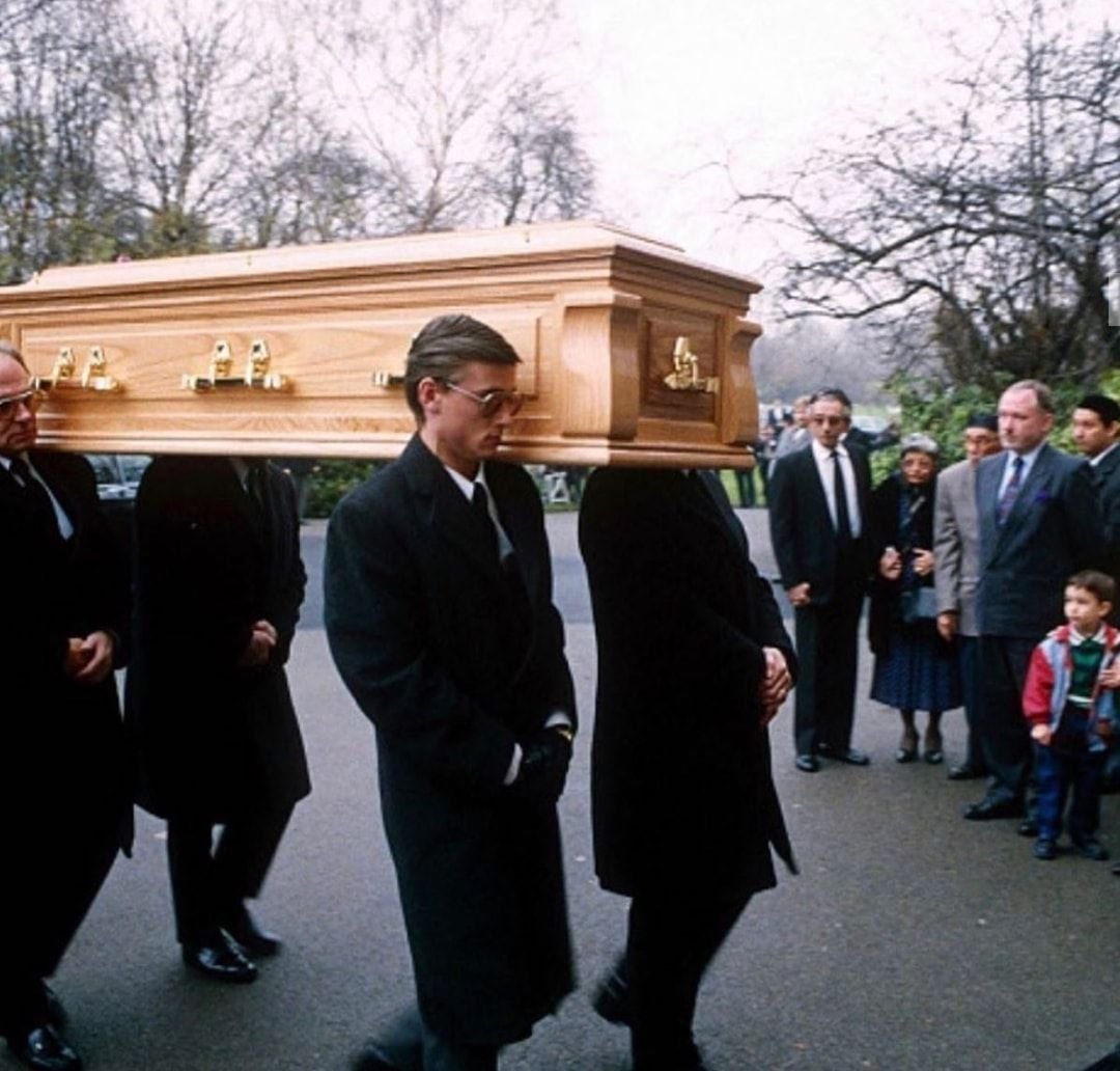 Freddie Mercury's coffin being carried at his funeral on 27 November 1991
